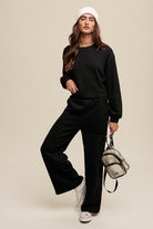 Women's black lounge set featuring a cropped pullover and wide-leg pants, perfect for casual wear, cozy loungewear, and trendy athleisure outfits for teens and young women